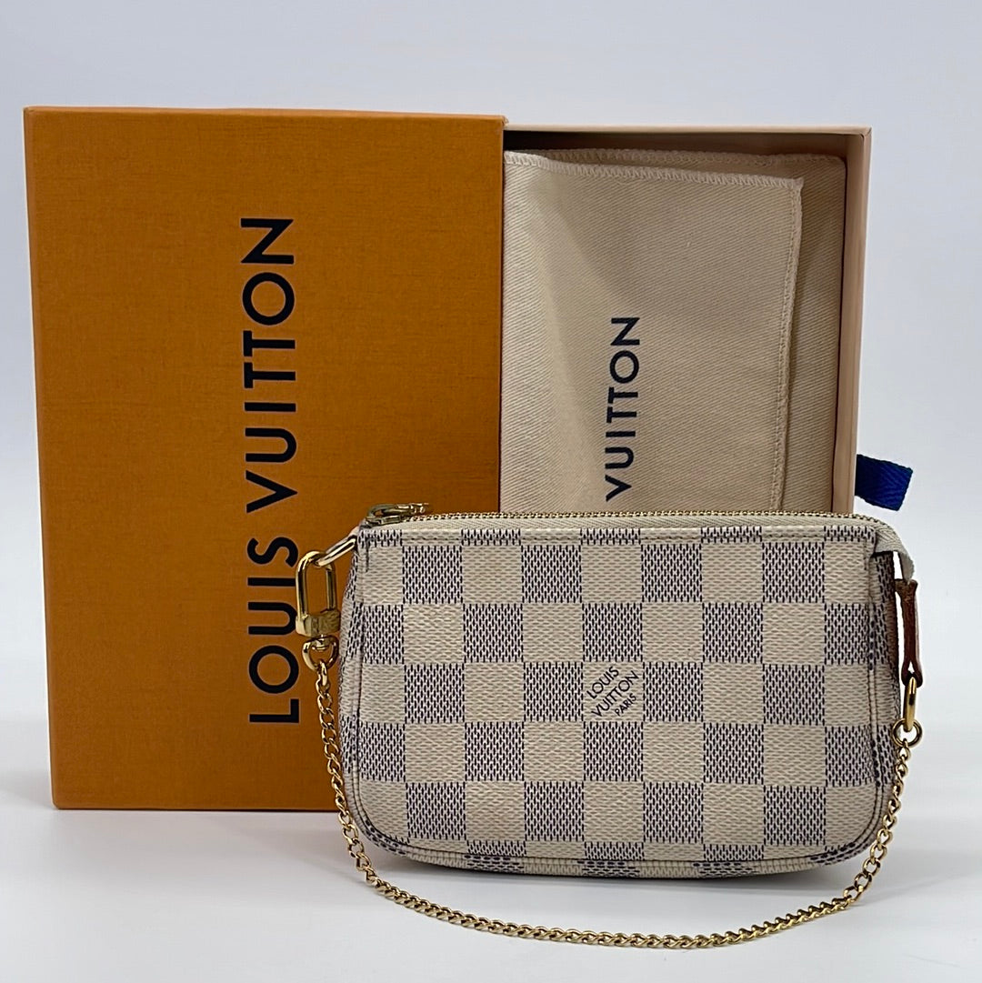 Authentic Louis Vuitton Mini Pochette Accessoires bag Azur With Dust Bag