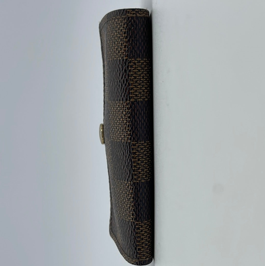 Preloved Louis Vuitton Damier Azur 6 Key Holder CT1103 021523 – KimmieBBags  LLC