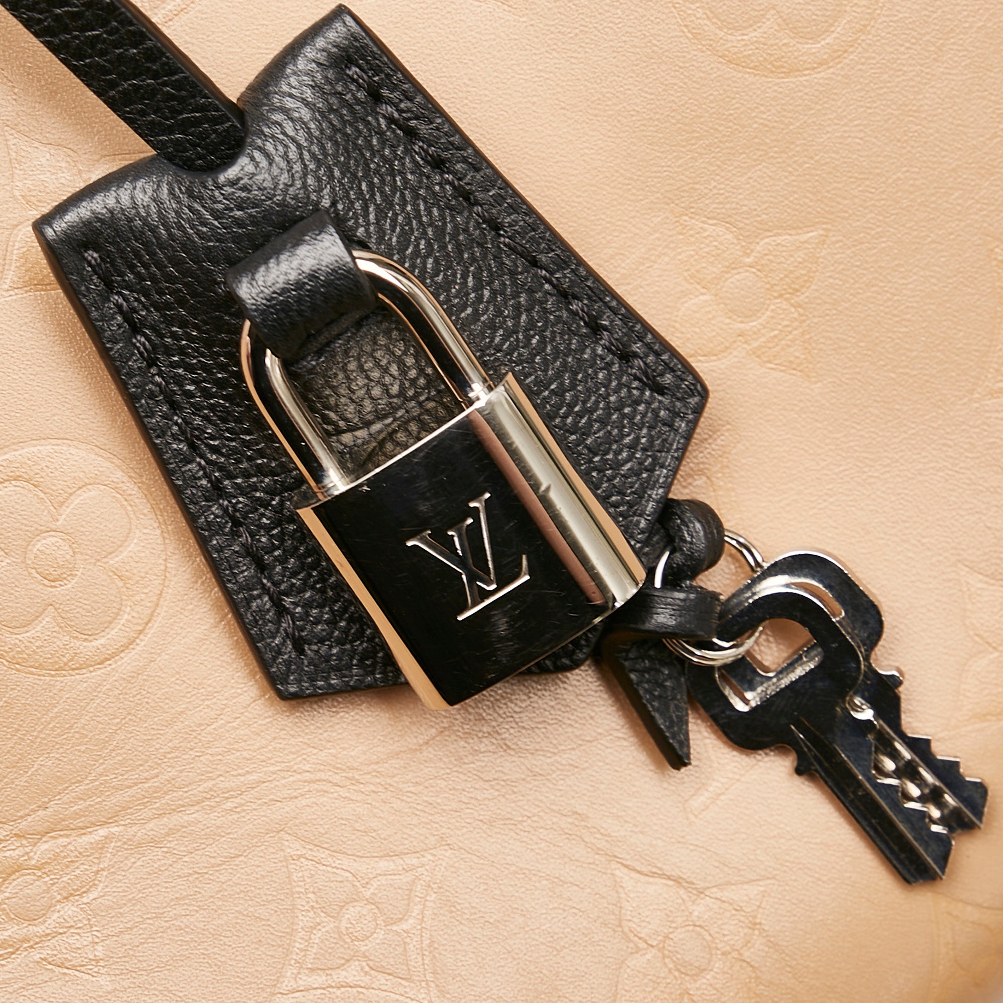 Preloved Louis Vuitton Tan Monogram Cuir Plume Very Zipped DR0158 0621 –  KimmieBBags LLC