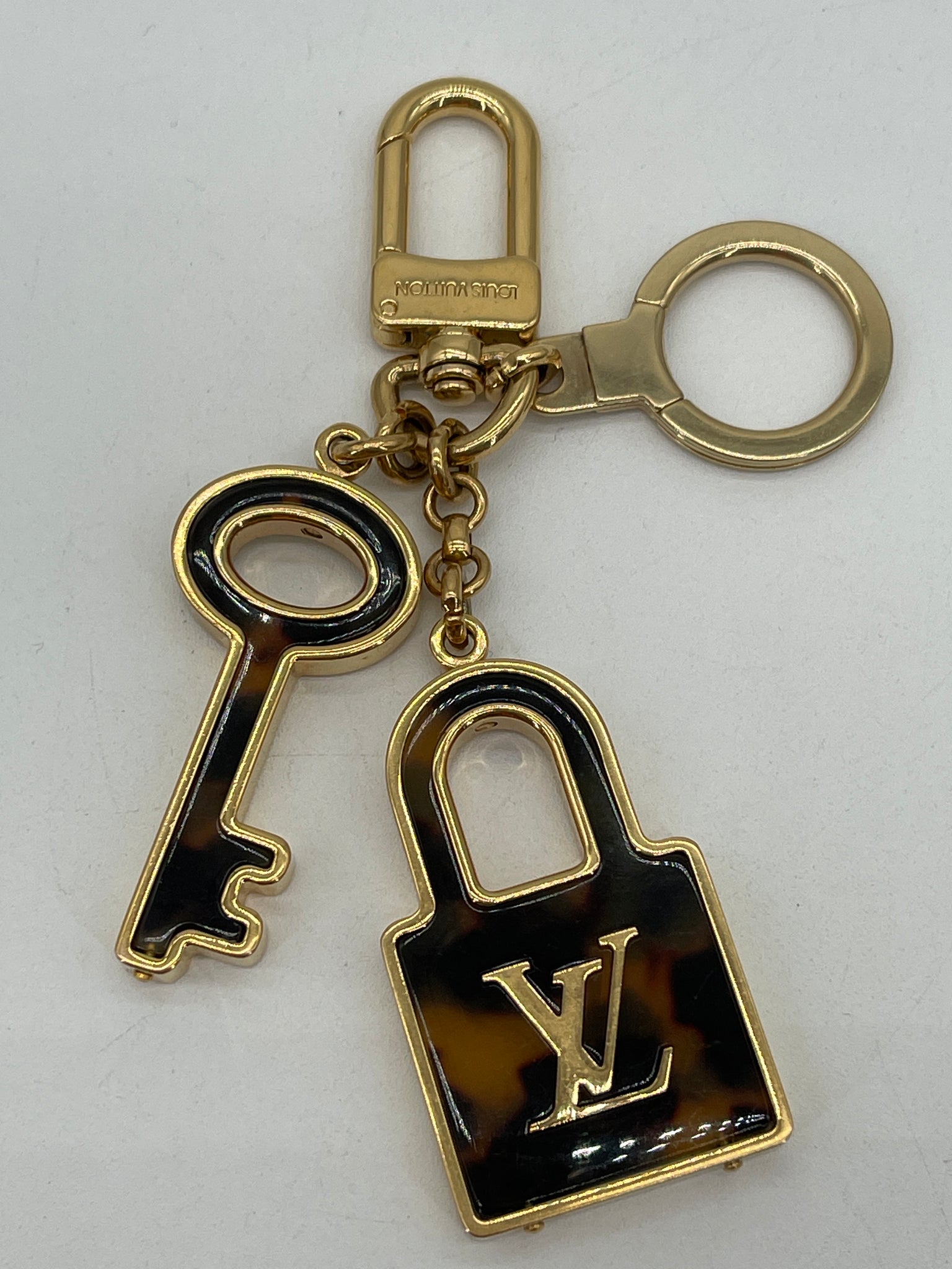 Preloved Louis Vuitton Lock and Key Gold and Tortoise Bag Charm