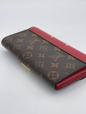 LOUIS VUITTON 'Pallas' wallet in brown monogram canvas and coral