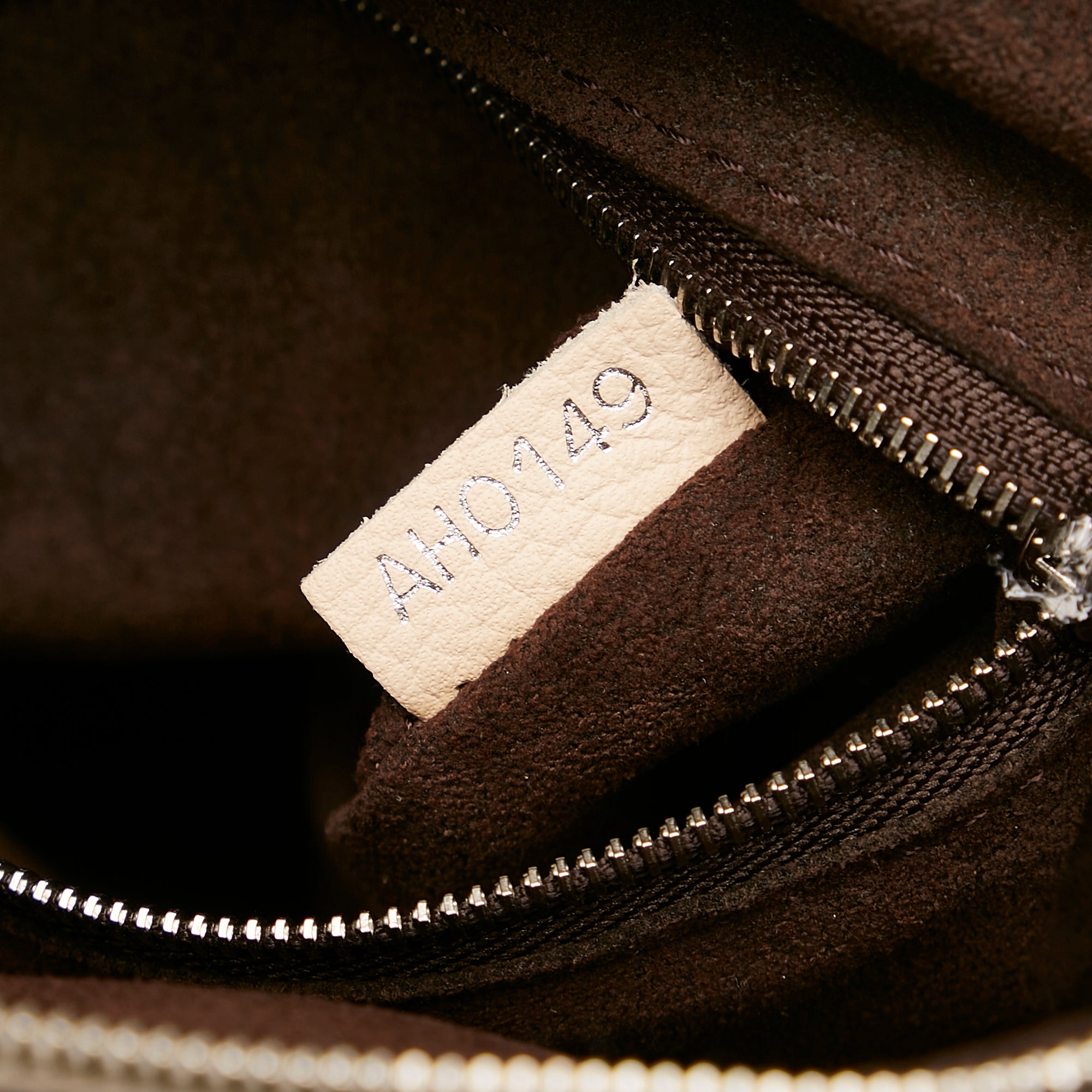 Louis Vuitton Ivory Perforated Monogram Mahina Leather Babylone