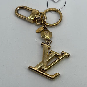 Louis Vuitton A Facettes Key Holder And Bag Charm.