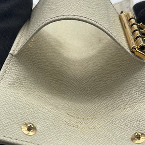 Preloved Louis Vuitton Beige Min Lin 4 Key Holder FL1016 091323 –  KimmieBBags LLC