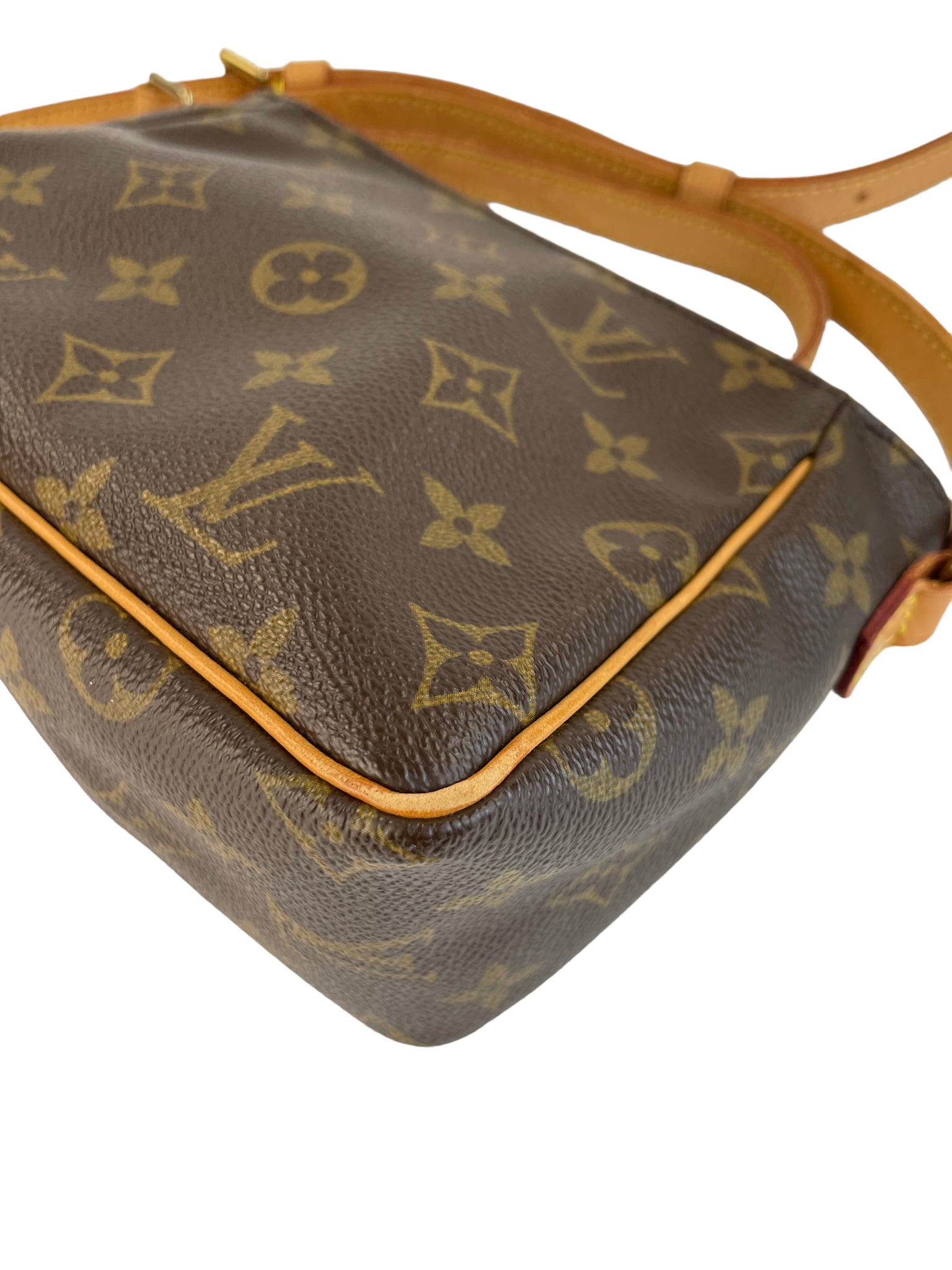 Monogram Viva cite PM Shoulder Bag，W19 × H14 × D9 cm，Good condition,  Lightly used with some visible marks and scratches.