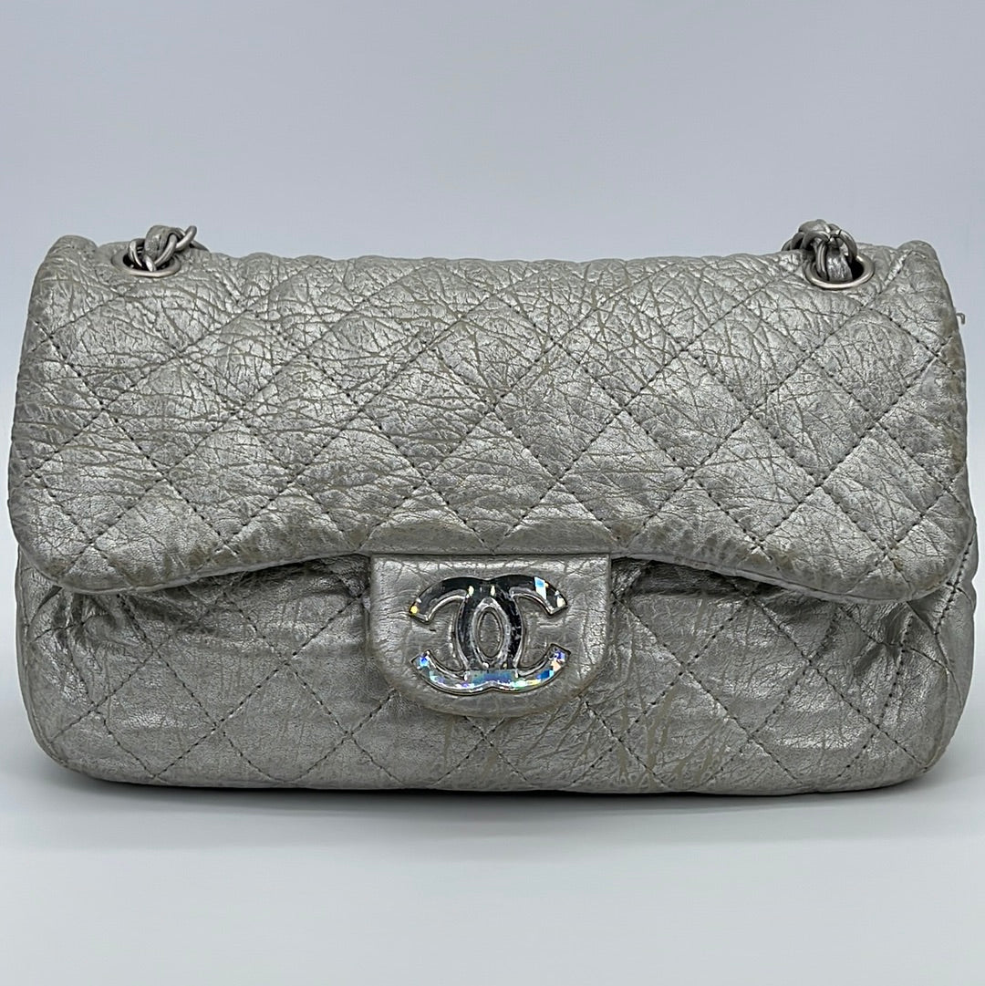 white and silver chanel bag vintage