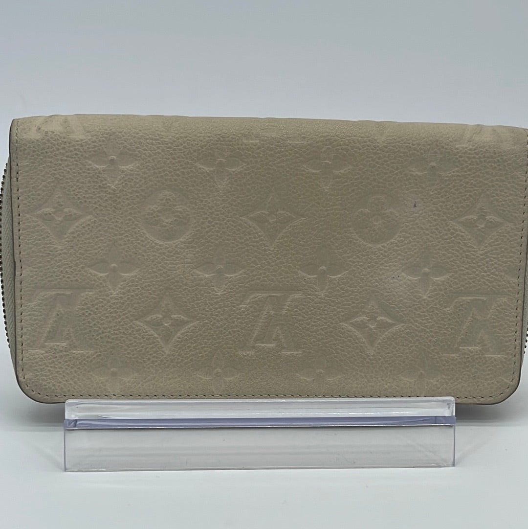 Preloved Louis Vuitton Plum Monogram Empreinte Portefeuille Curieuse Leather Wallet CA0125 092923