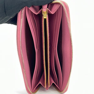 Authentic Prada Saffiano Pink Leather Ribbon Zip Around Wallet