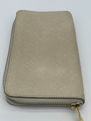 Preloved Louis Vuitton Ivory Monogram Empriente Zip Wallet CMQB28J 052223 - $110 OFF DEAL