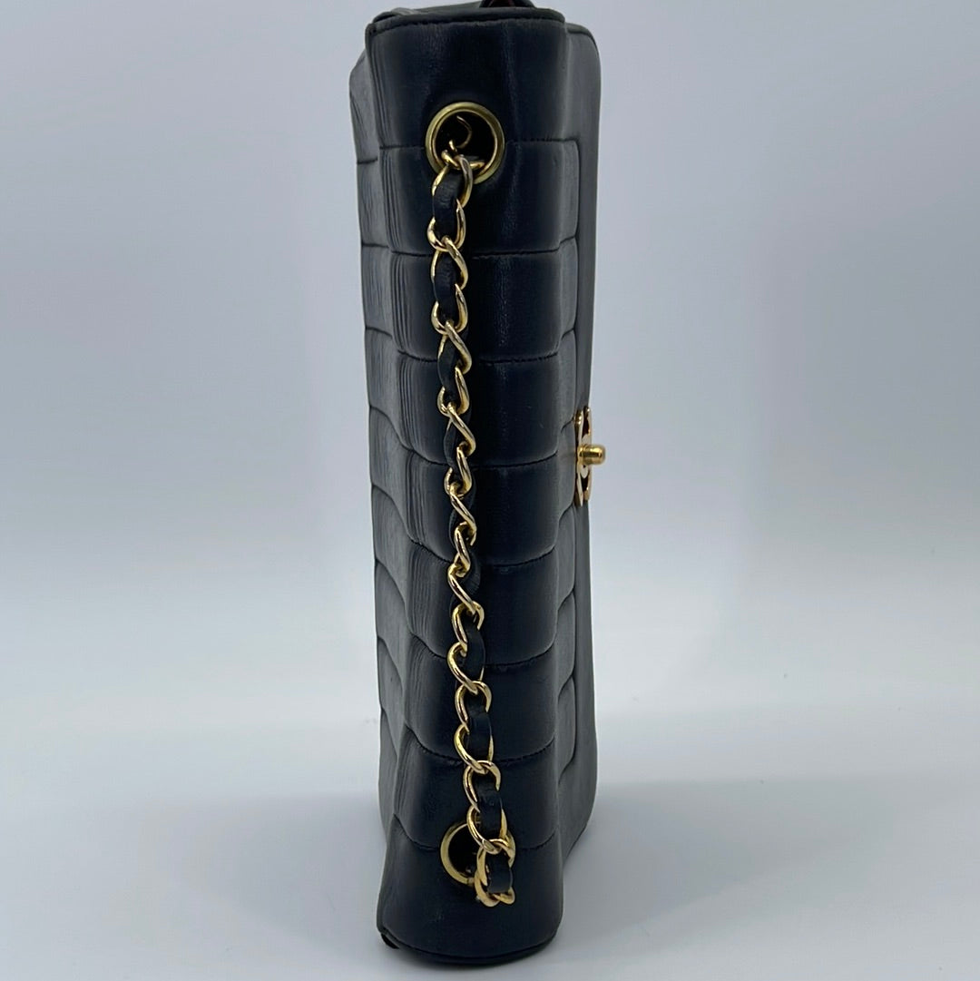 Vintage CHANEL Black Vertical Quilted Lambskin Medium Chain Flap Bag 2282428 070523