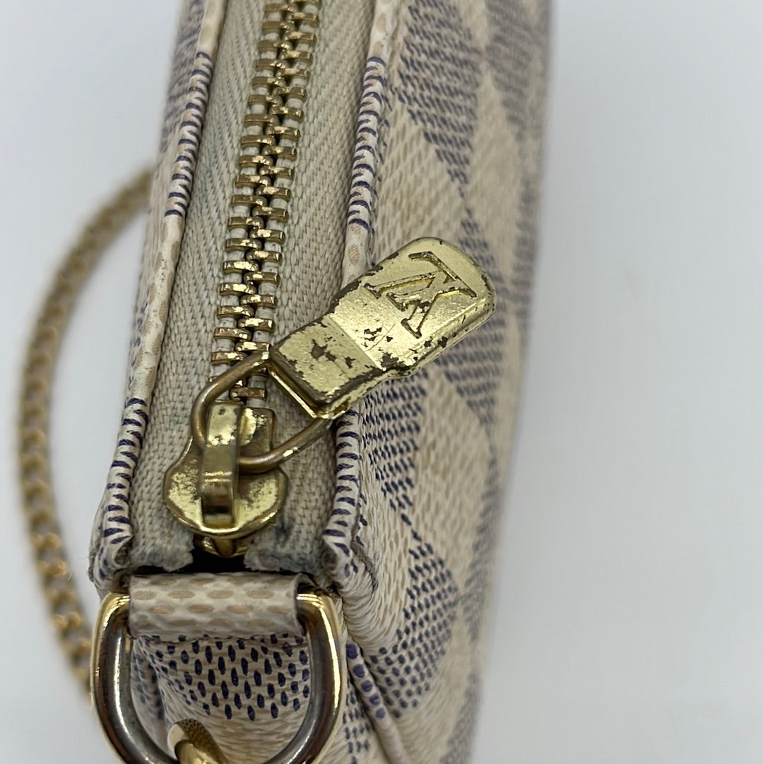 Authentic Louis Vuitton Mini Pochette Accessoires bag Azur With Dust Bag