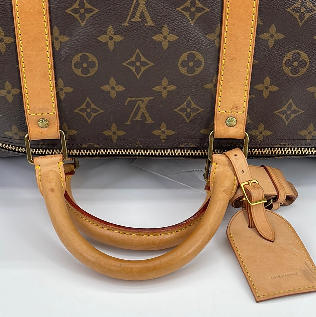 Louis Vuitton Keepall 55 Bandoulière Monogram Canvas Travel Bag on
