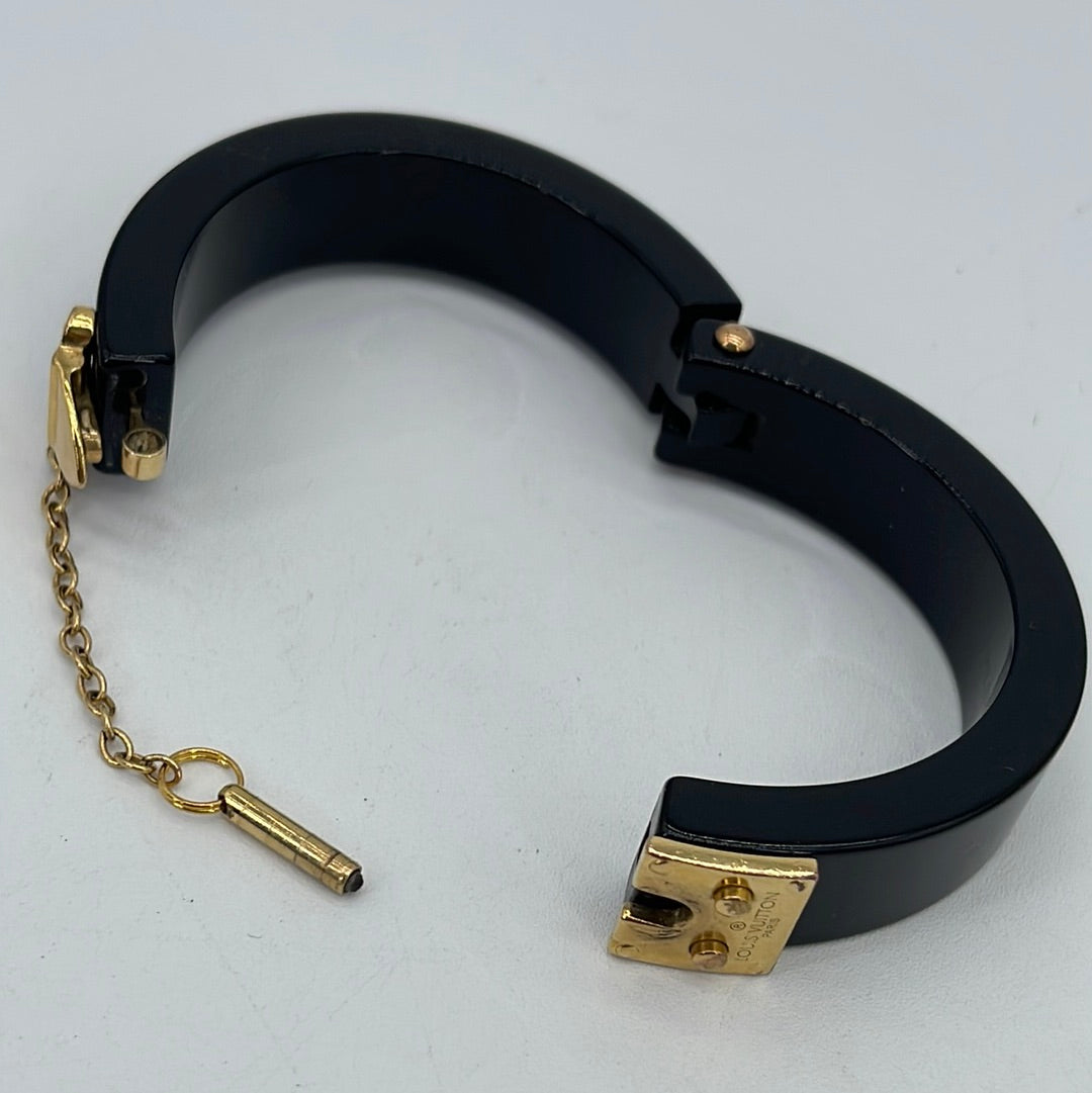 Preloved Louis Vuitton Lock Me Black Resin Bracelet 64 062323 – KimmieBBags  LLC