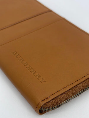 PRELOVED BURBERRY Long Tan Leather Zippy Wallet 33H4W2C 050323 - 100 OFF DEAL