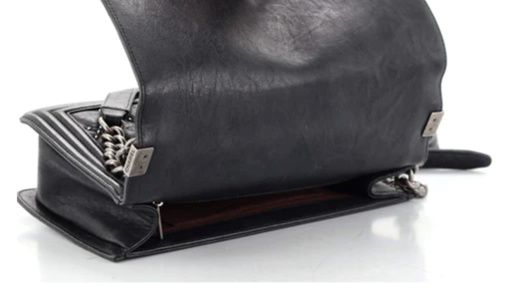 PRELOVED CHANEL Studded Black Quilted Distressed Calfskin New Medium Boy Bag