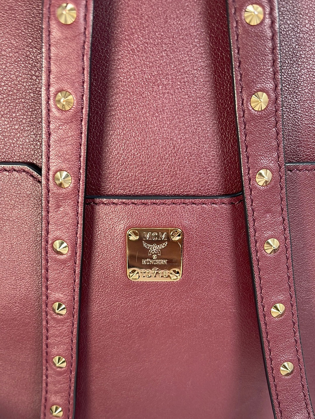 Preloved MCM Studded Polke Burgundy Leather BackPack MWK7ADK27NK001 012423