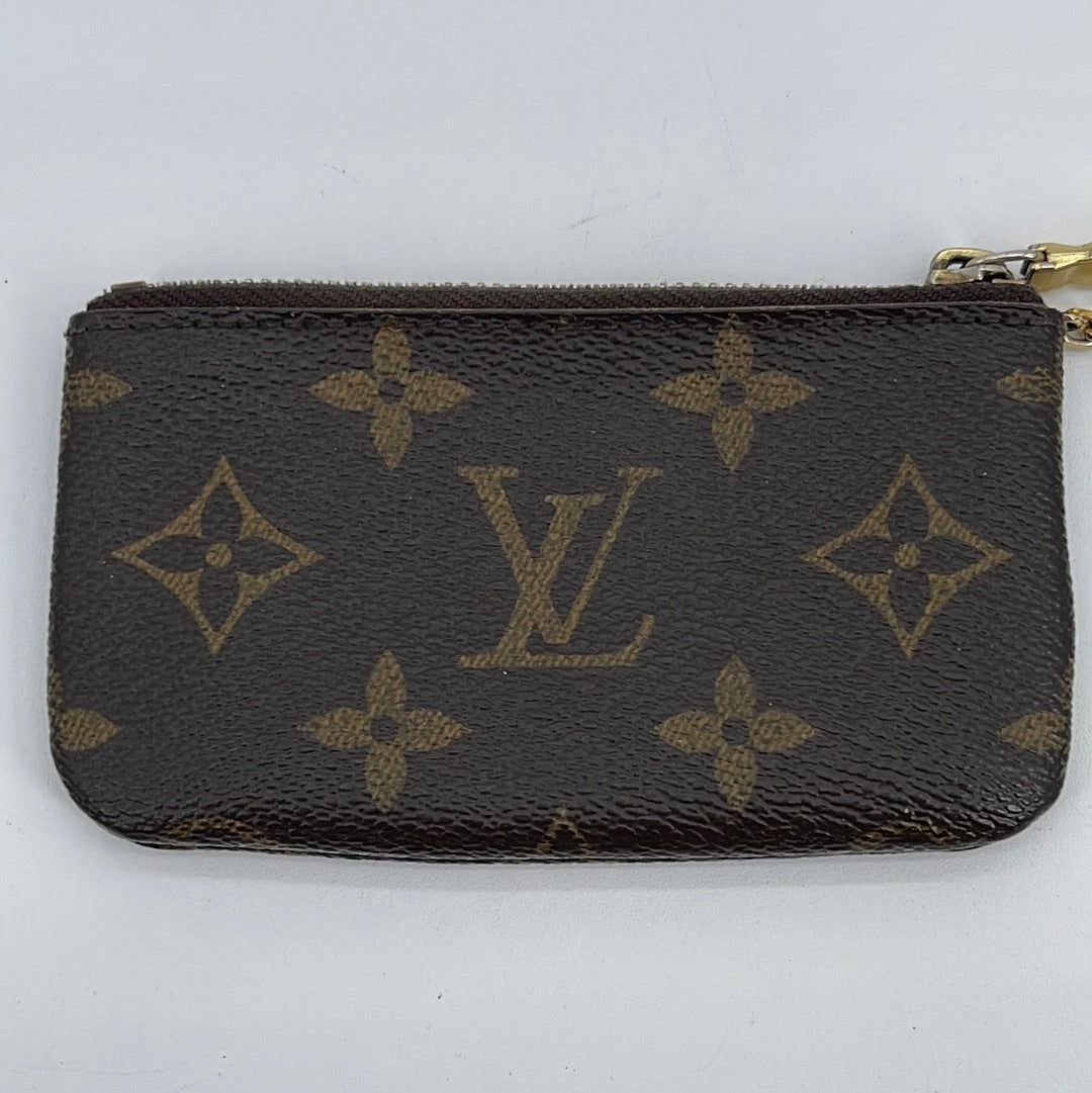Authentic) Pre-loved Louis Vuitton 6-Key Holder Monogram Key Pouch, Women's  Fashion, Bags & Wallets, Wallets & Card Holders on Carousell