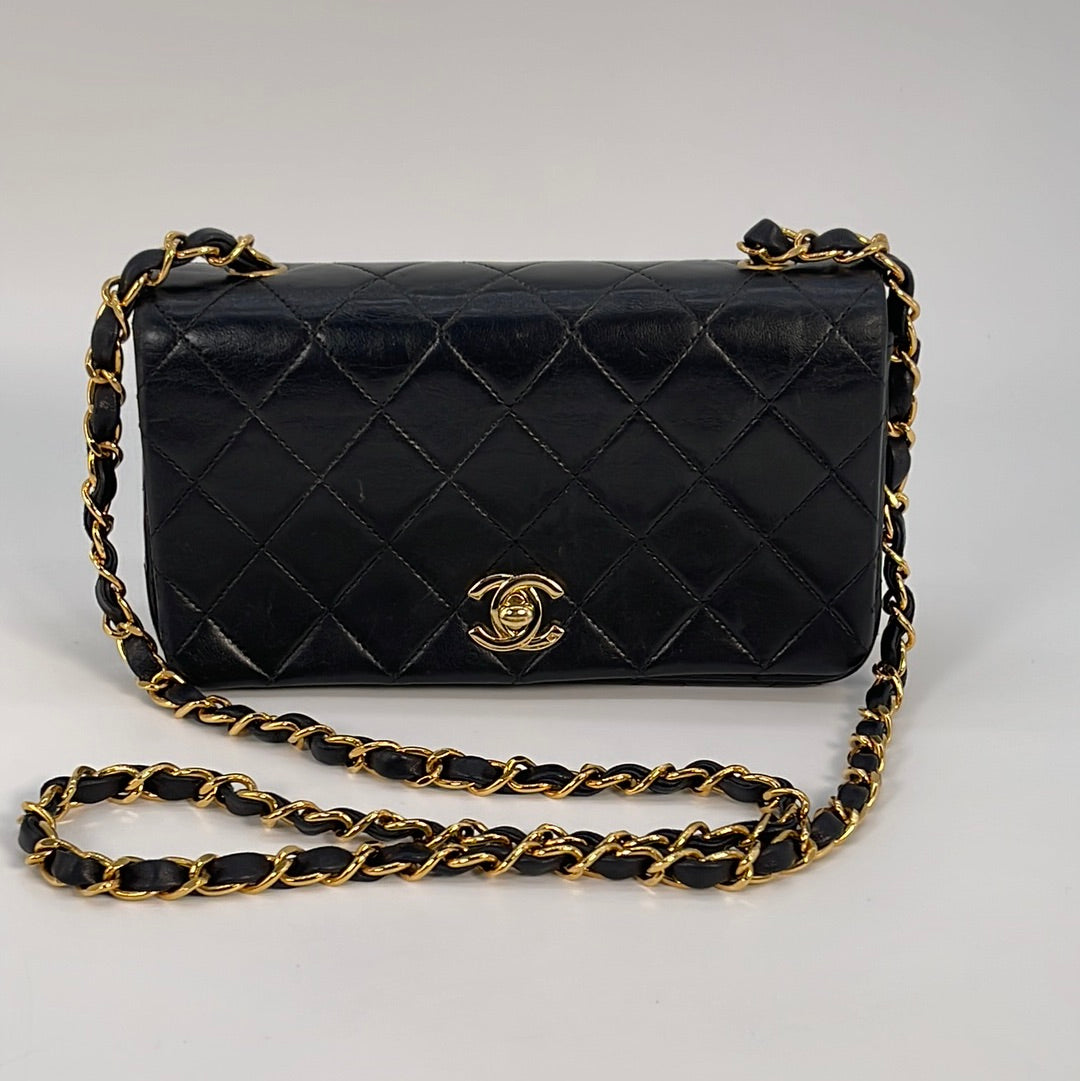 Vintage CHANEL Black Quilted Lambskin Mini Full Flap Bag 1256328 013023