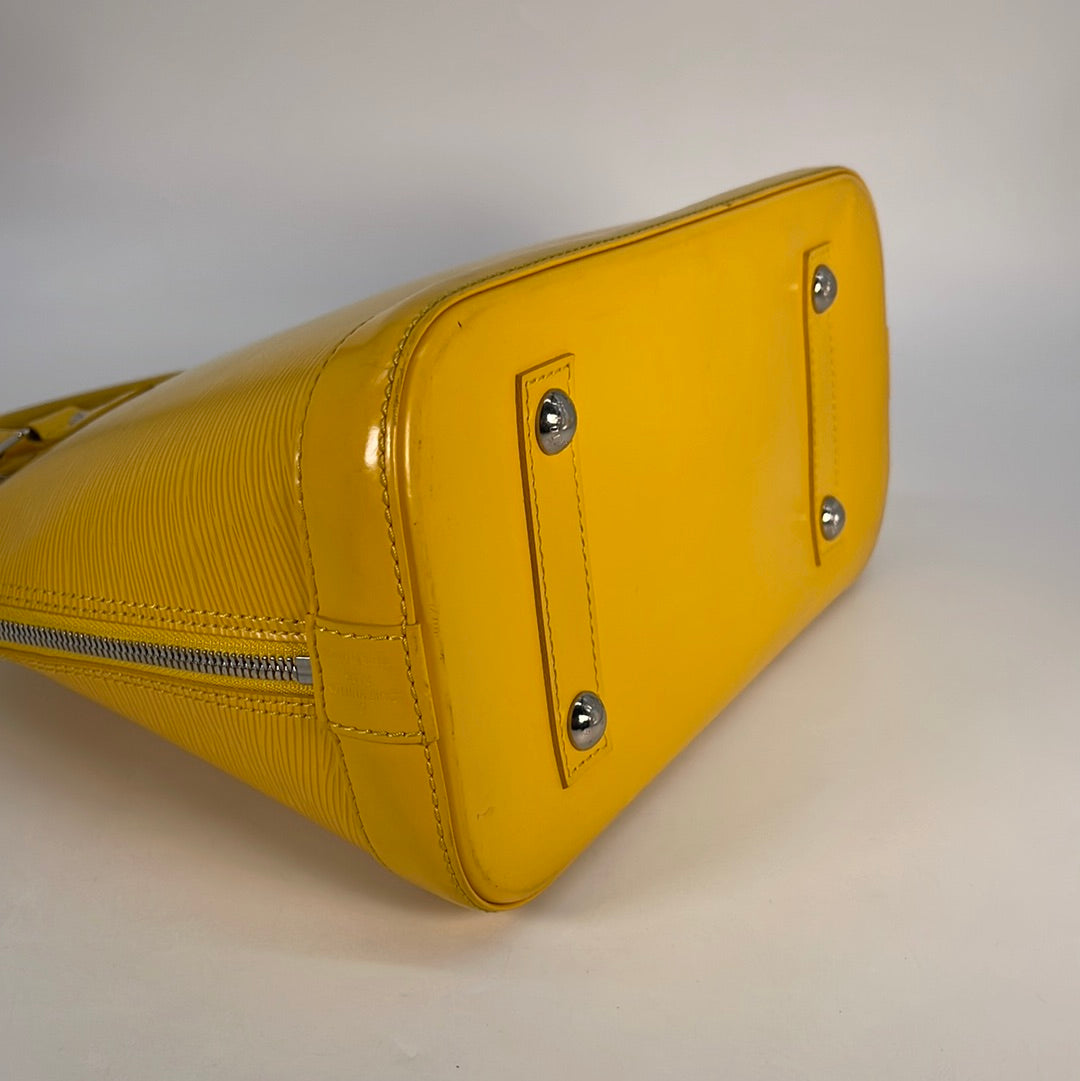 Louis Vuitton Yellow Epi Leather Alma PM Top Handle Bag.  Luxury, Lot  #78012