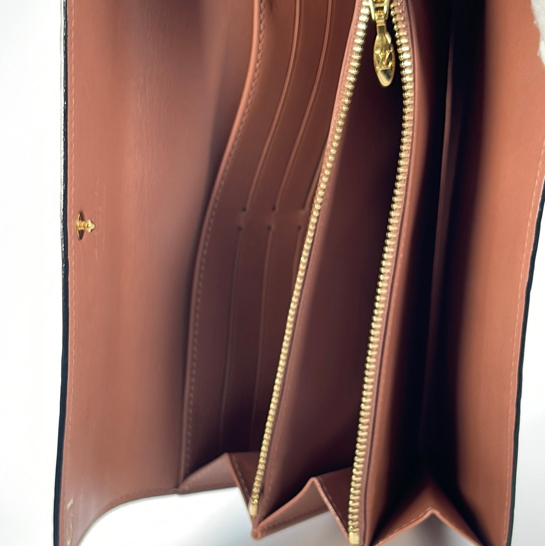 Cloth wallet Louis Vuitton Brown in Cloth - 23140303