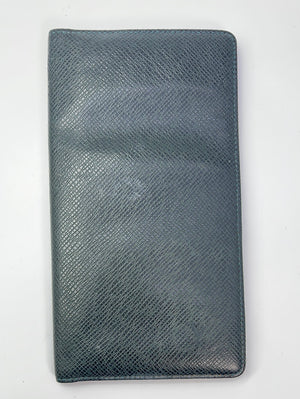 SOLD-Authentic Louis Vuitton Taiga leather long wallet. 4” x 6.5