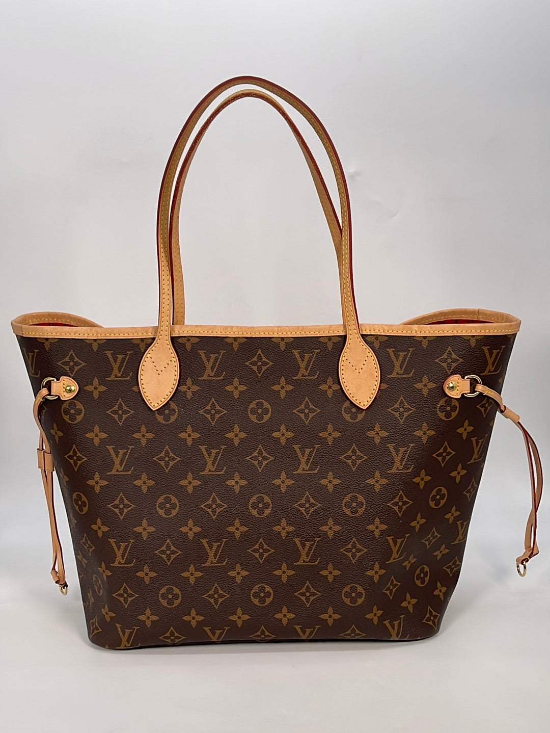 brown louis vuitton bag with red inside