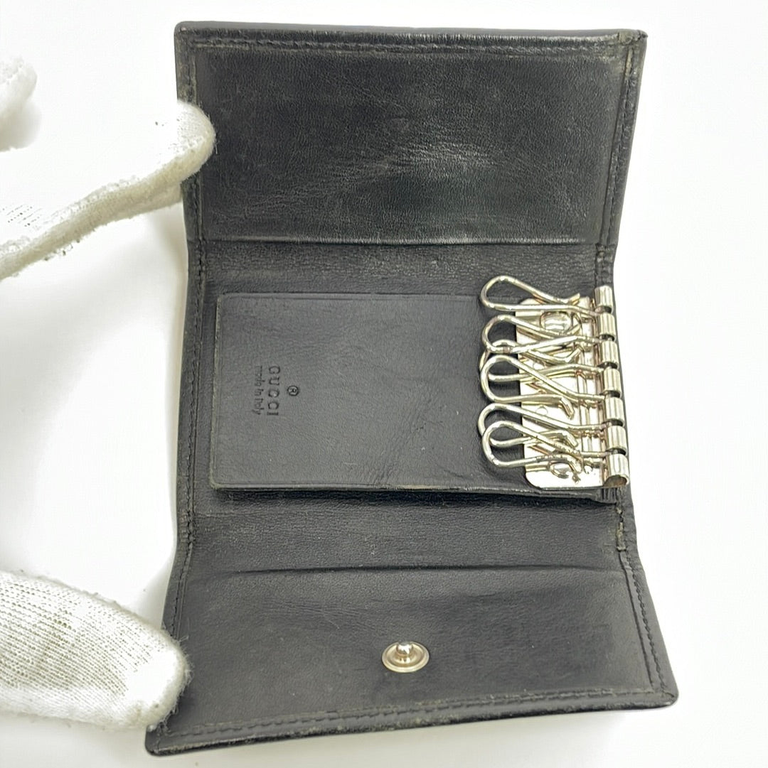 Gucci key holder and card holder. - Bukowskis