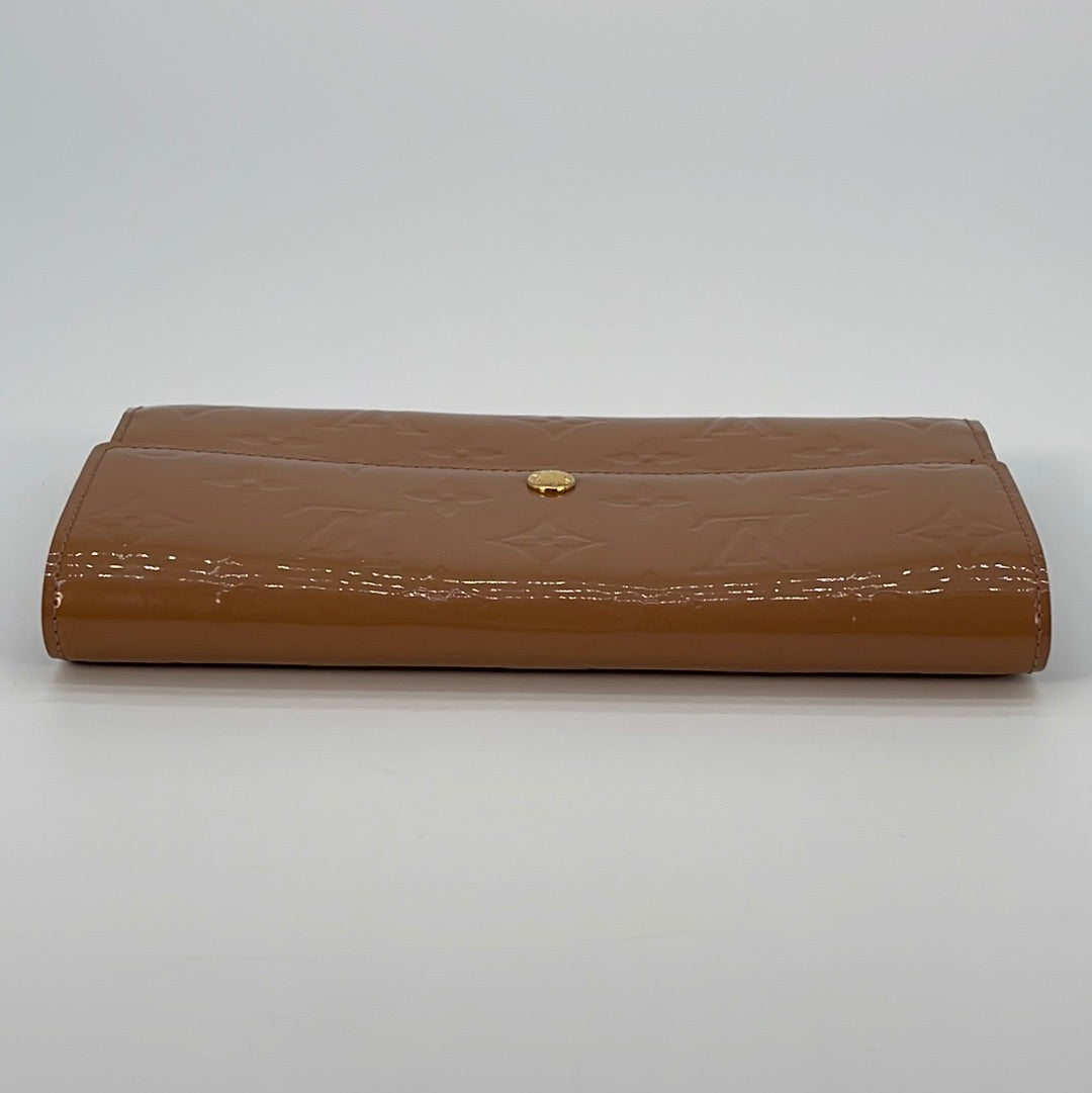 Leather wallet Louis Vuitton Brown in Leather - 32481273