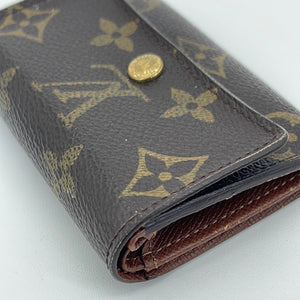 Louis Vuitton Dark Brown Coated Canvas Monogram Fold Over Flap Wallets —  Labels Resale Boutique